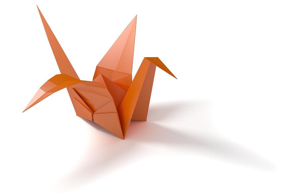 an orange origami crane